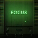 FOCUS" neon sign. 