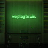 "WE PLAY TO WIN." NEON SKILT